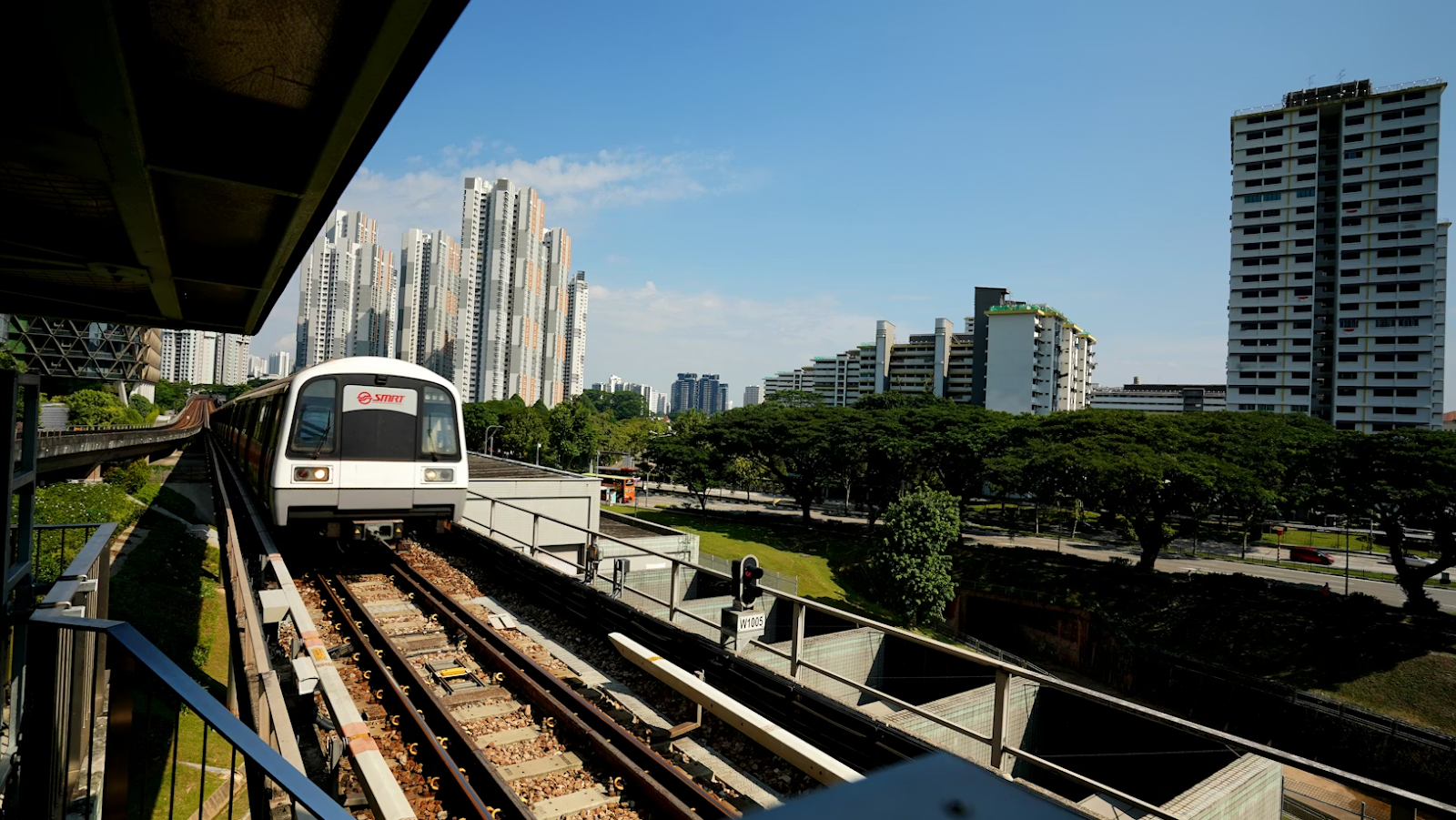 SMRT train traveling on elevated tracks in Singapore